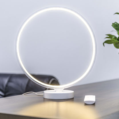 Limifo full moon lamp glowing warm white on a nightstand